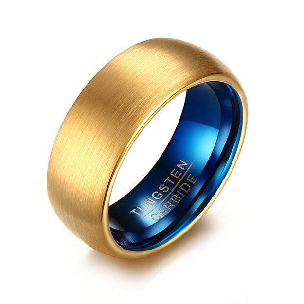 A brushed gold ring with a vibrant blue interior, featuring the text 'TUNGSTEN CARBIDE' engraved inside, shown on a clean white background.